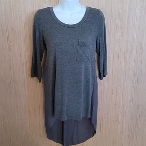 Long quarter sleeved top with sheer bottom of back